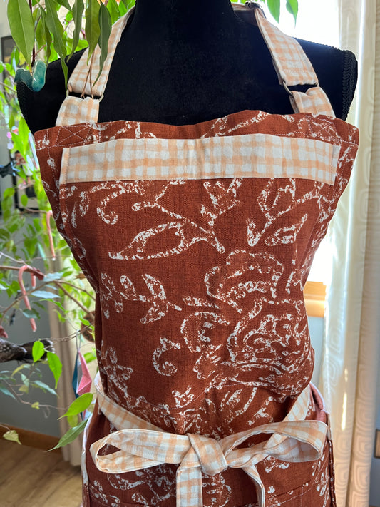 Split-leg Pottery Apron - Rusty Orange with White Floral, orange gingham trim