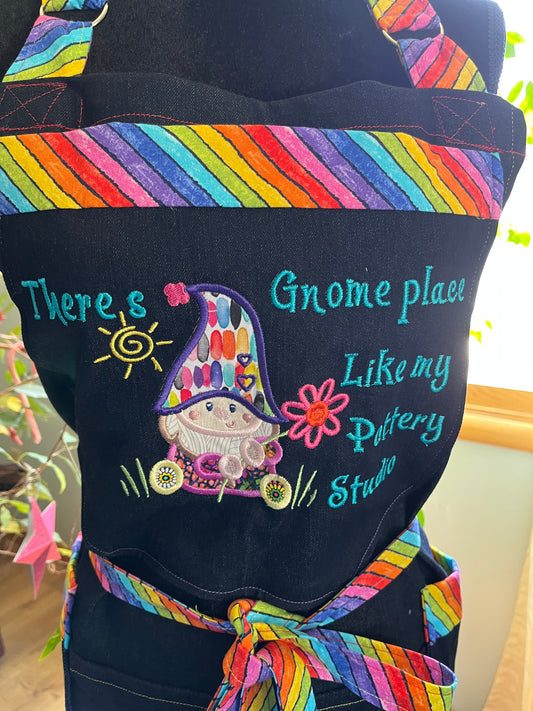 Split-leg Pottery Apron - Cotton/spandex indigo denim with No Gnome Place embroidery and rainbow trim