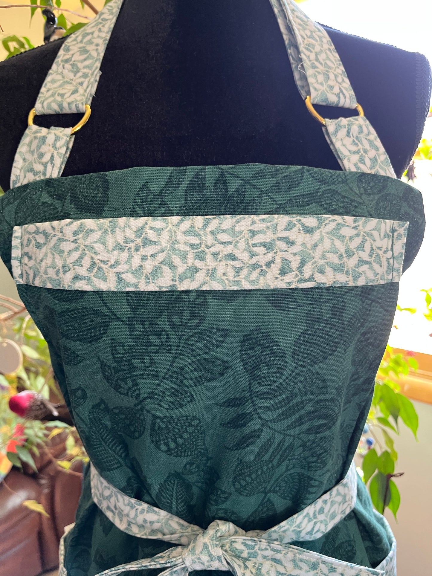 Split-leg Pottery Apron - Dark Green Tone on tone foliage with white and green trim