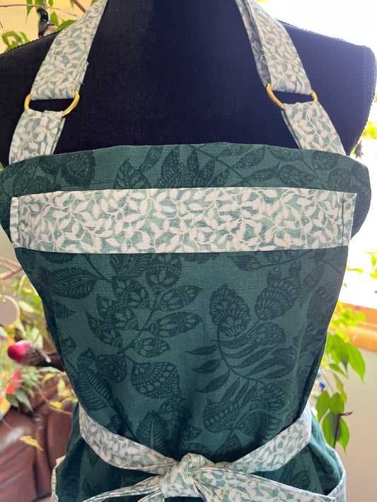 Split-leg Pottery Apron - Dark Green Tone on tone foliage with white and green trim