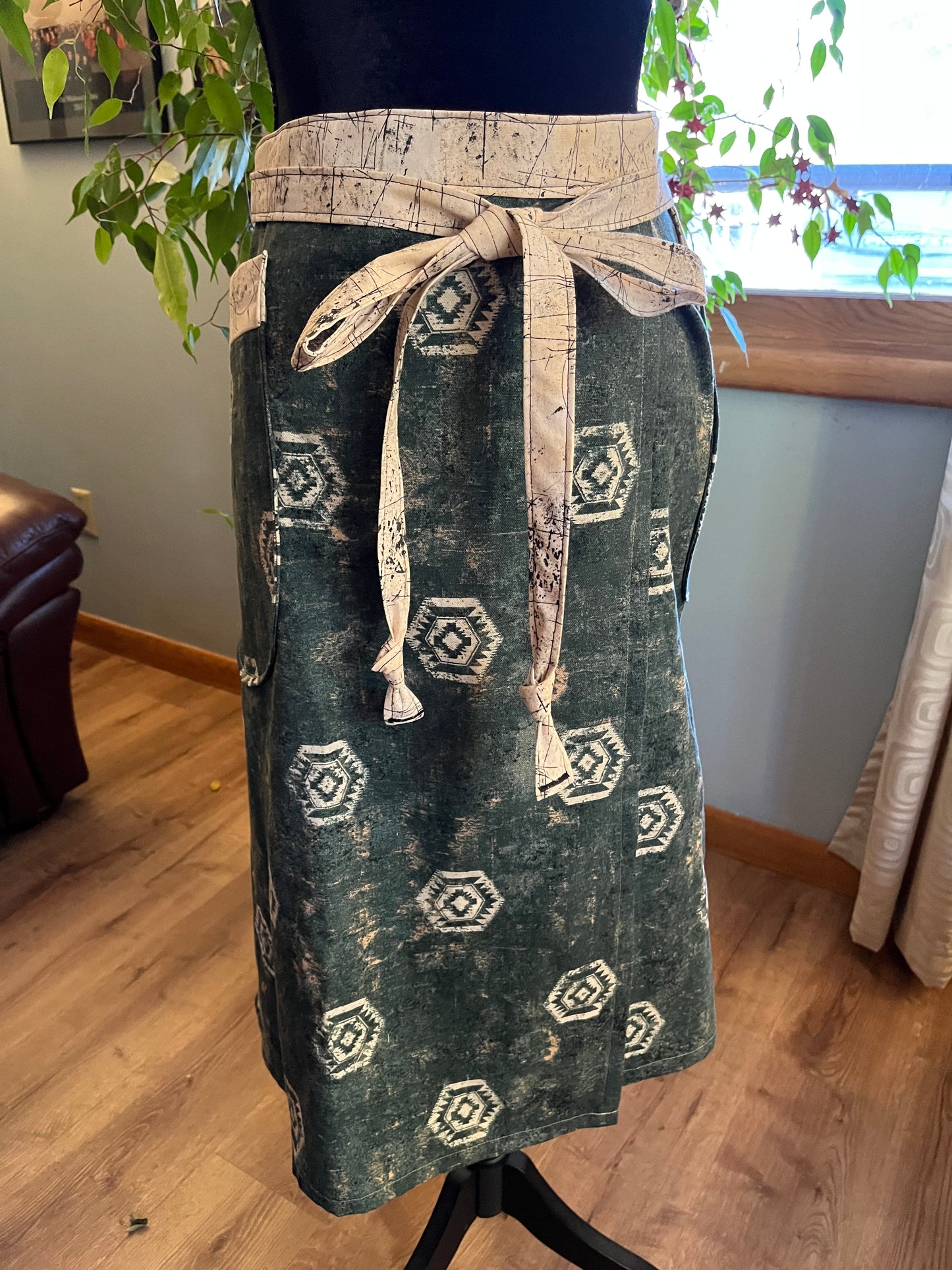 Split-leg Pottery Half Apron - Distressed Cream Medallions on Green with cream & black trim