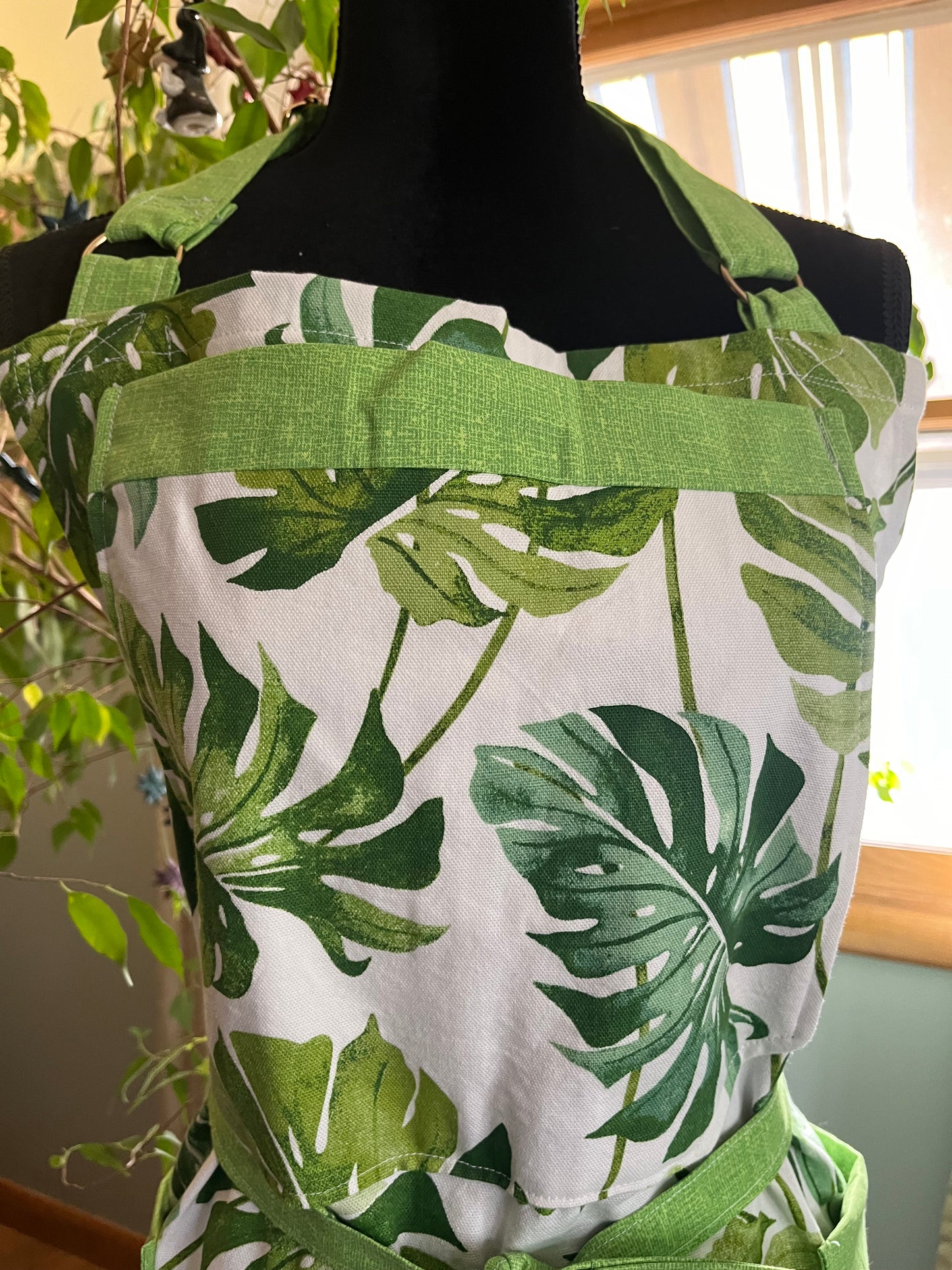 Plus-sized Split Leg Pottery Apron - Monstera leaves, lime green trim