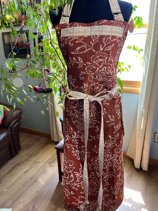 Split-leg Pottery Apron - Rusty Orange with White Floral, orange gingham trim