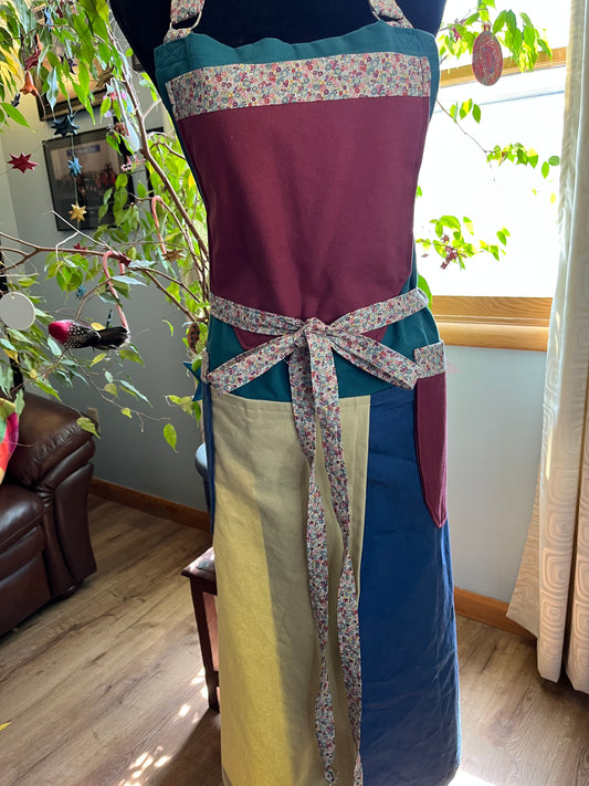 Split-leg Pottery Apron - Color block Canvas -green and wild plum bib with ditsy floral trim
