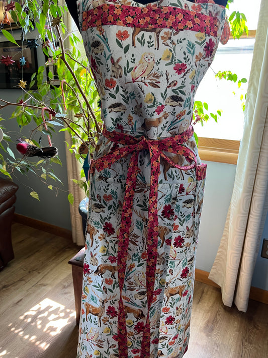 Split-leg Pottery Apron - Forest Animal print with orange floral trim